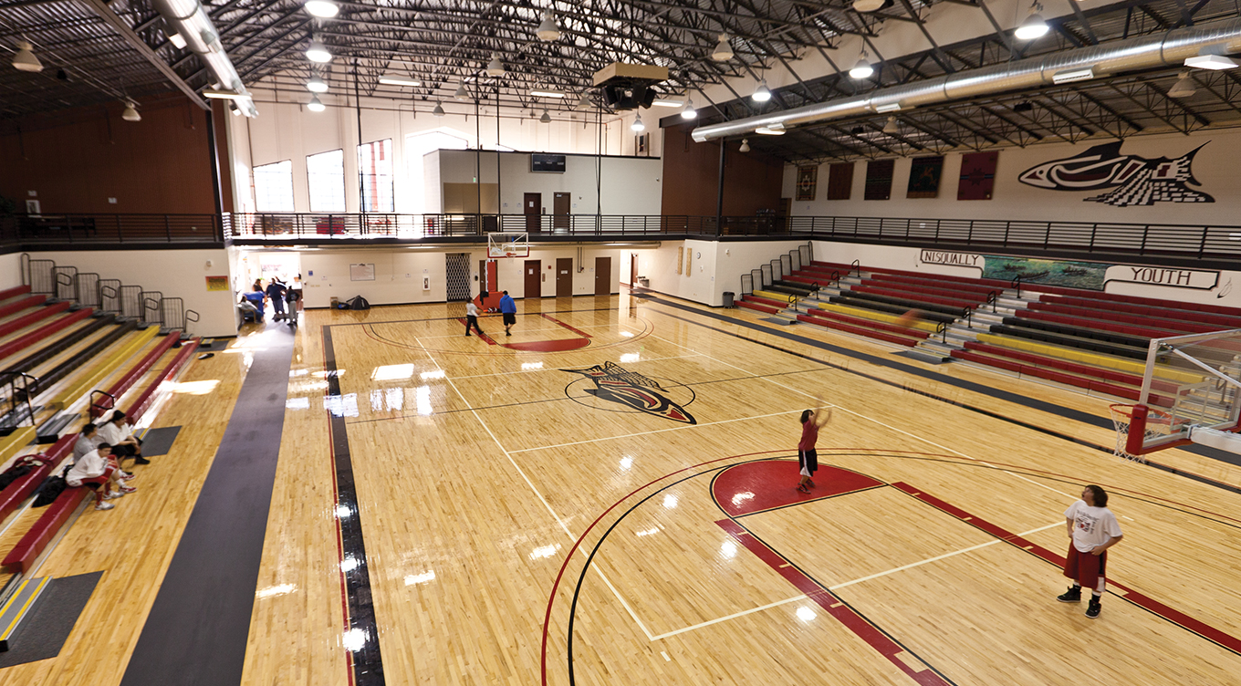 Custom photoshoot of Nisqually Indian Tribe branded basketball court