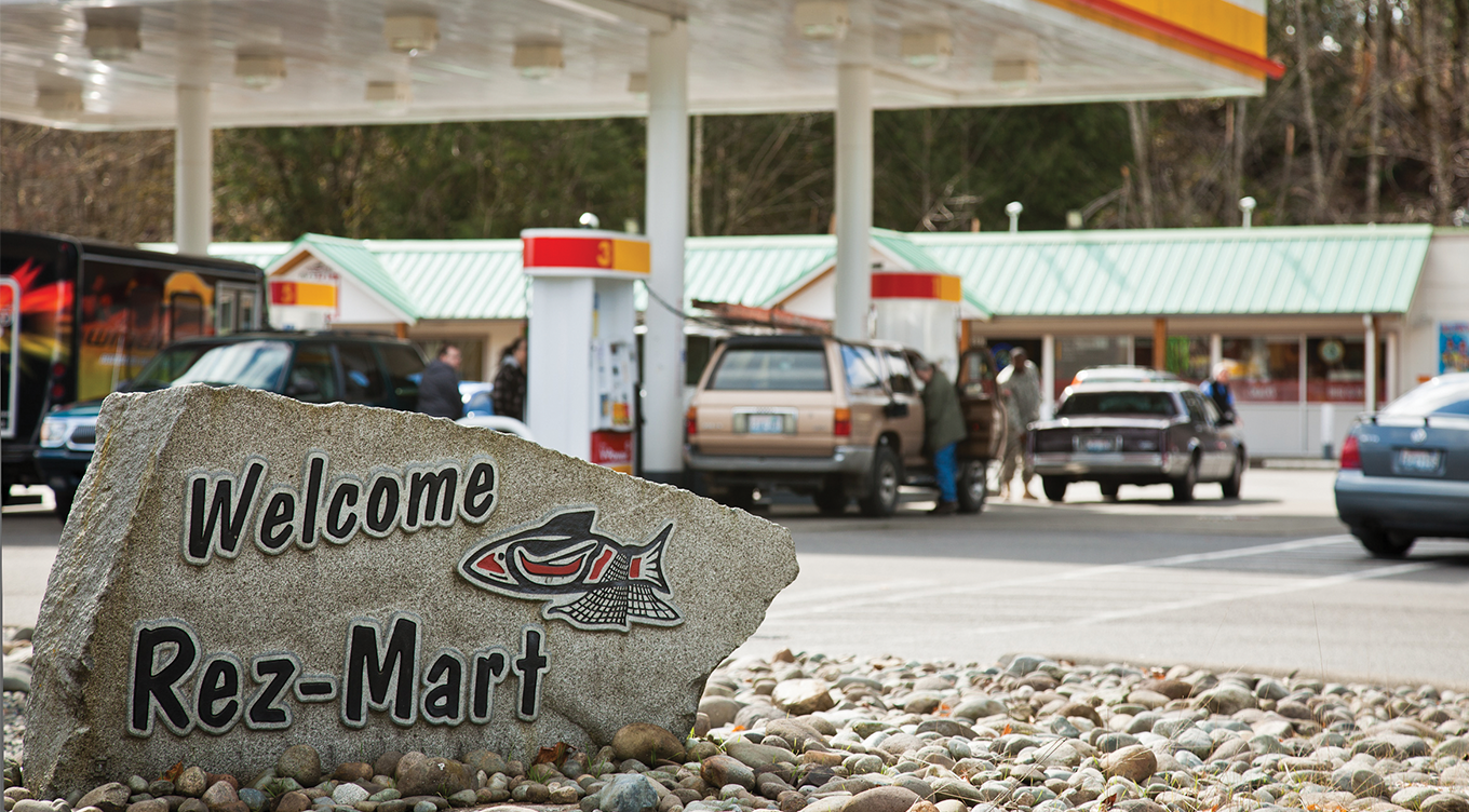 Custom photoshoot showing gas station with sign for welcoming visitors to the Rez Mart