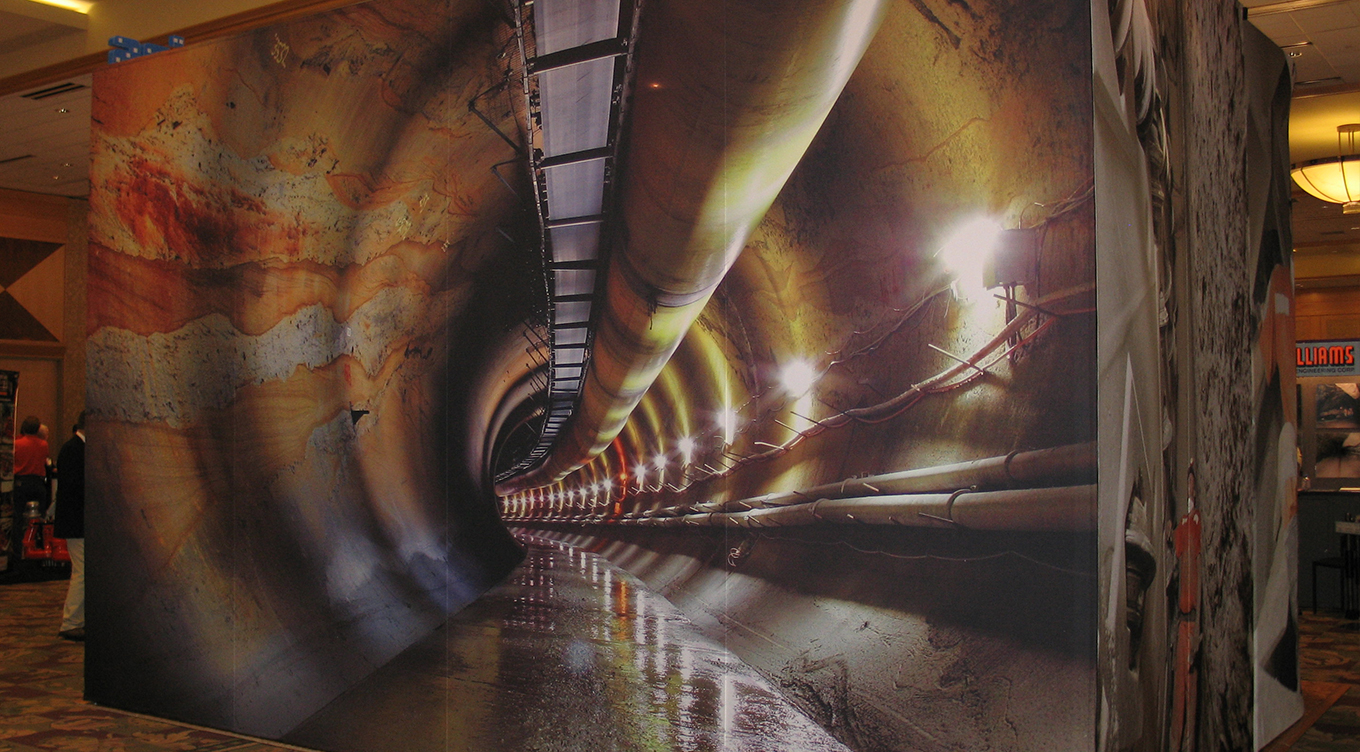 Tradeshow booth design of large poster with image of tunnel interior