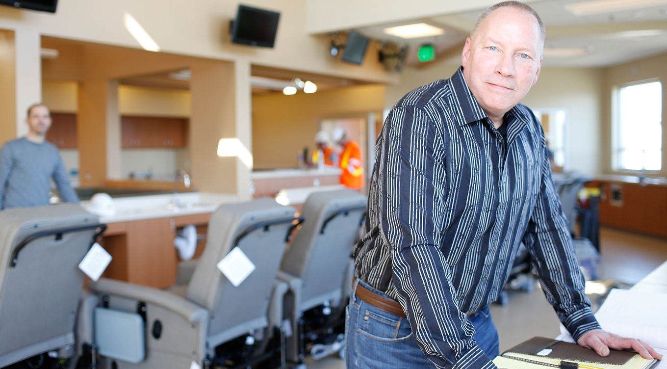 Image of custom photoshoot of contractor at desk