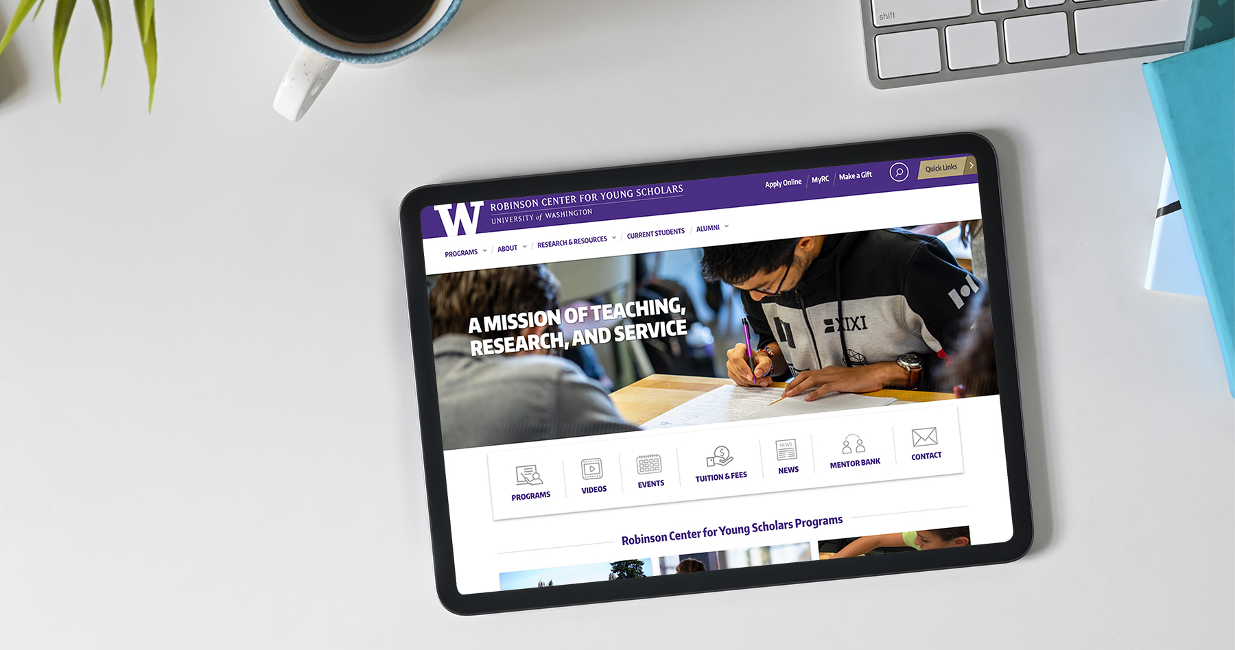 Ipad with responsive website design for the UW Robinson Center for Young Scholars
