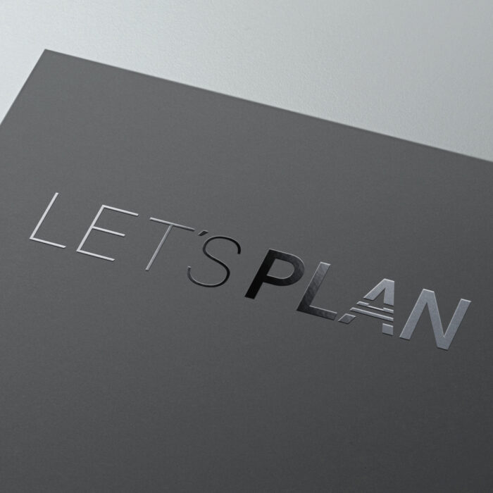 Let's Plan™ logo mark in gloss on black business card